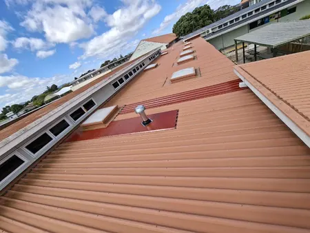 A new vent pipe through the C block roof with a fresh flashing