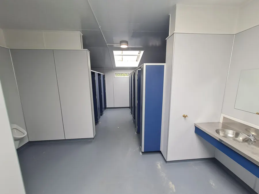 The finished row of new toilet cubicles and a basin at the Kai Iwi Lakes toilet block