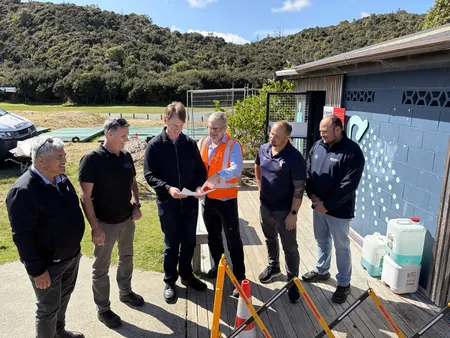 Council and project team members on site at the refurbished Kai Iwi Lakes toilet block